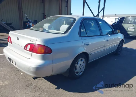1999 Toyota Corolla Ce/Le из США, поврежденный, VIN 2T1BR12E2XC747502